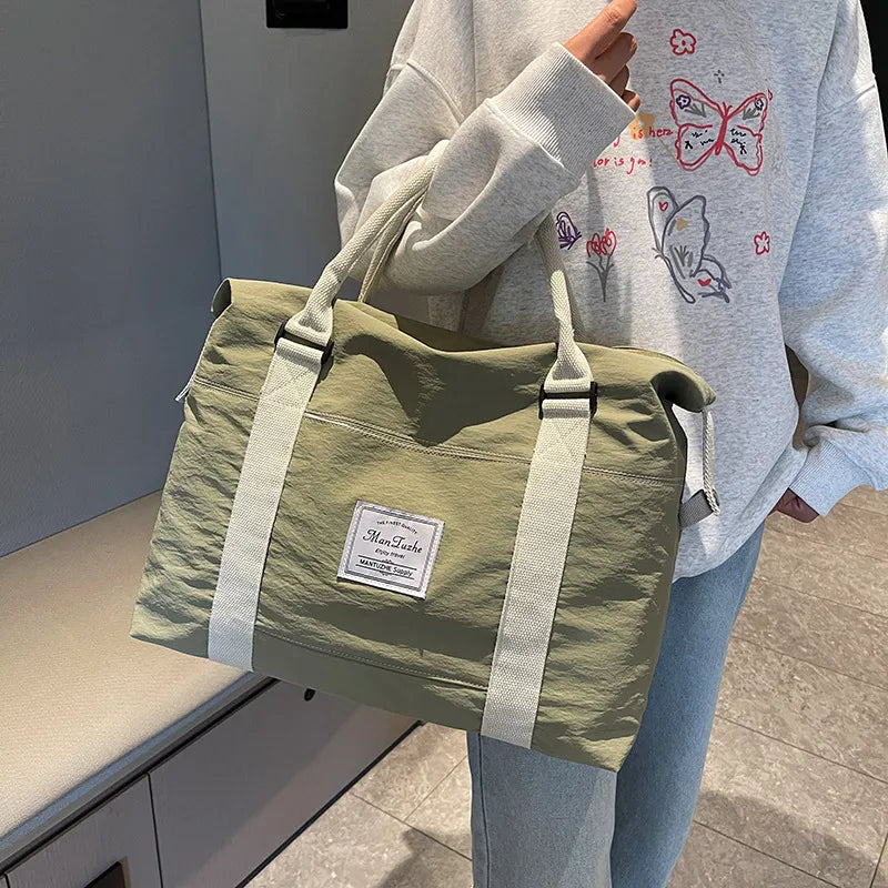 Weekend travel holdall carried over the shoulder